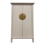 LIMS Legacy Singapore Asian style cabinet in light neutral finish with brass hardware and tapered legs. Features double doors with a round brass closure.