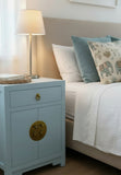 LIMS Legacy Singapore light blue bedside cabinet with brass hardware, one drawer and double doors with Chinese clasp.